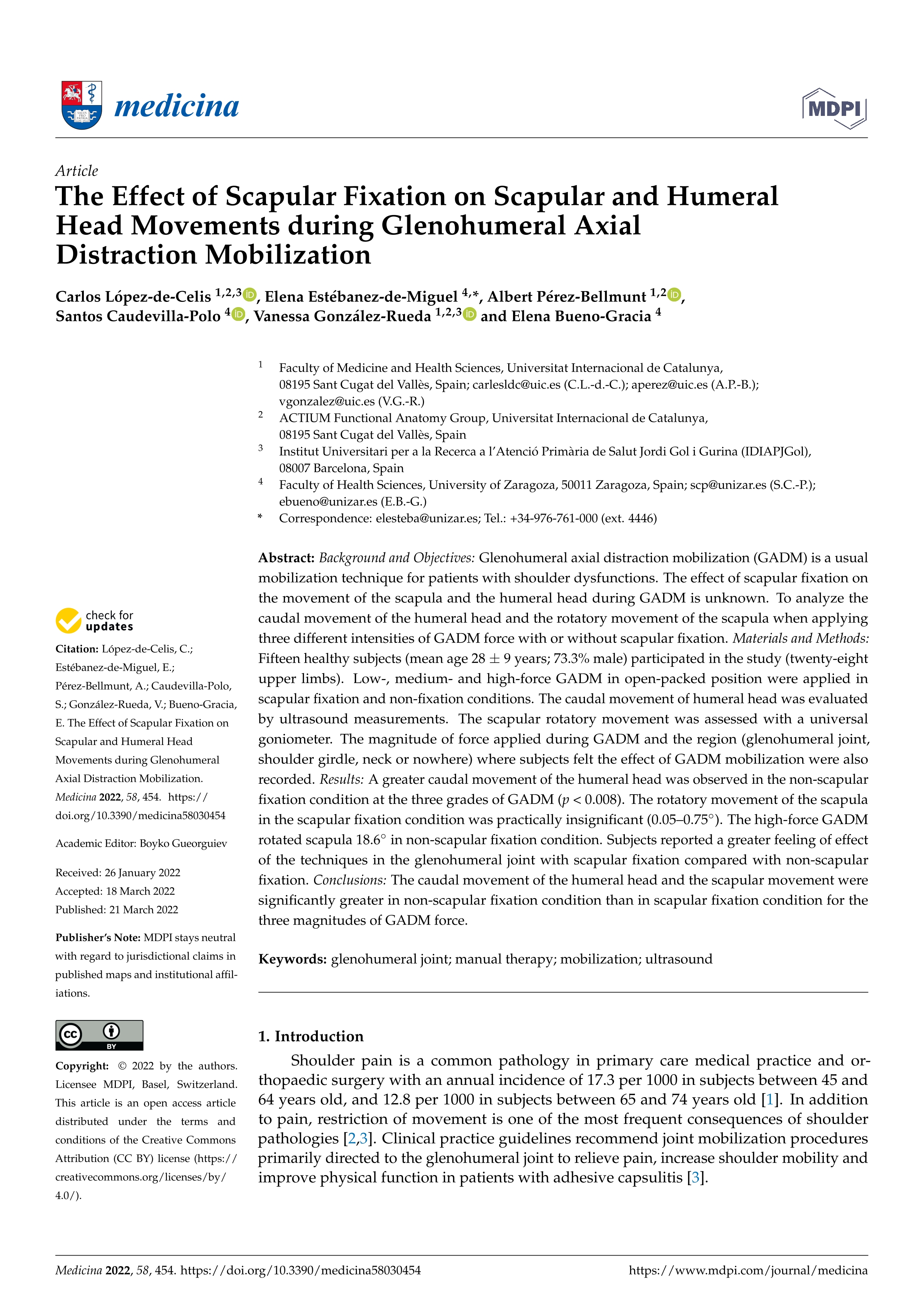 The Effect of Scapular Fixation on Scapular and Humeral Head Movements during Glenohumeral Axial Distraction Mobilization