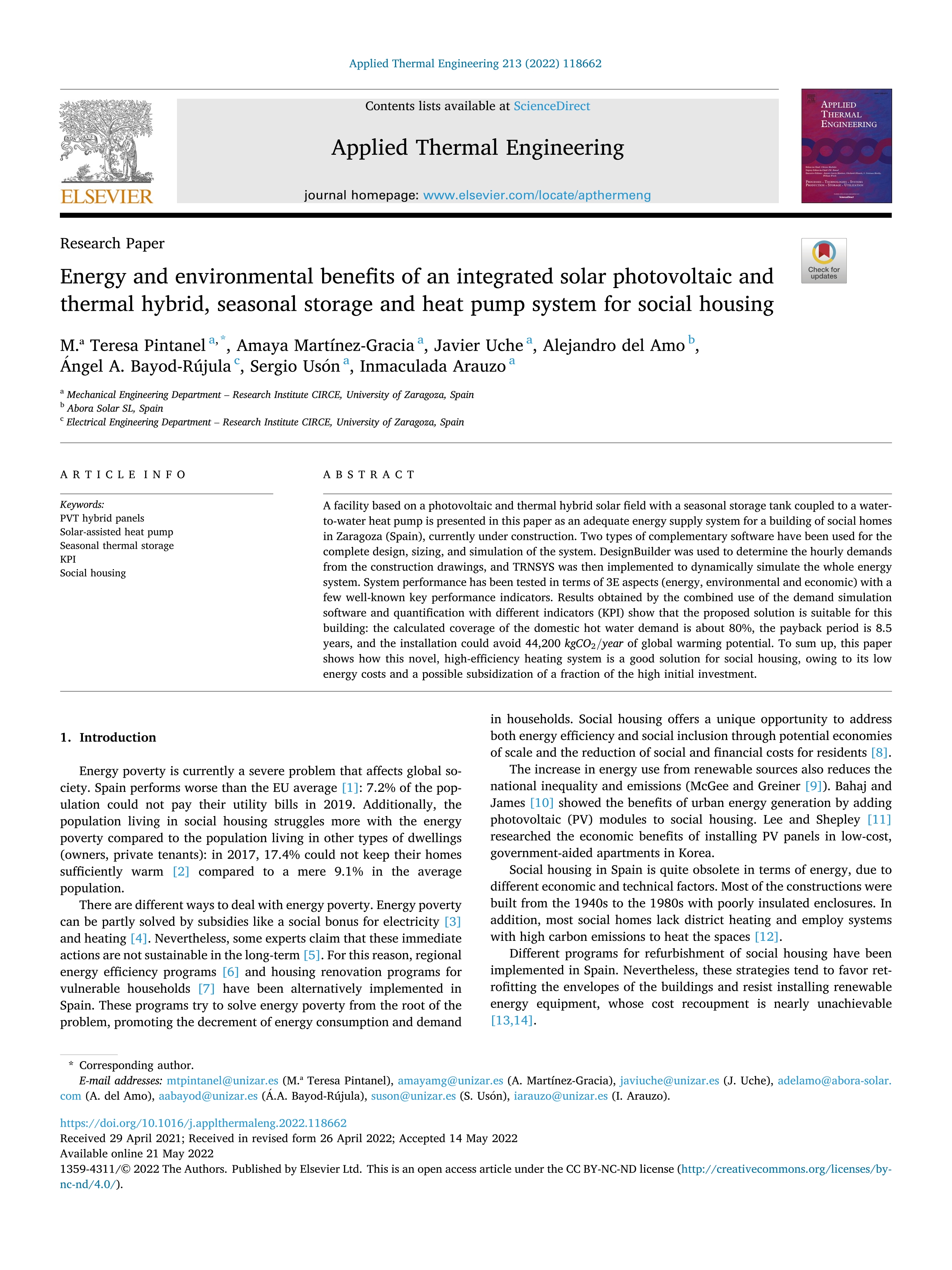 Energy and environmental benefits of an integrated solar photovoltaic and thermal hybrid, seasonal storage and heat pump system for social housing