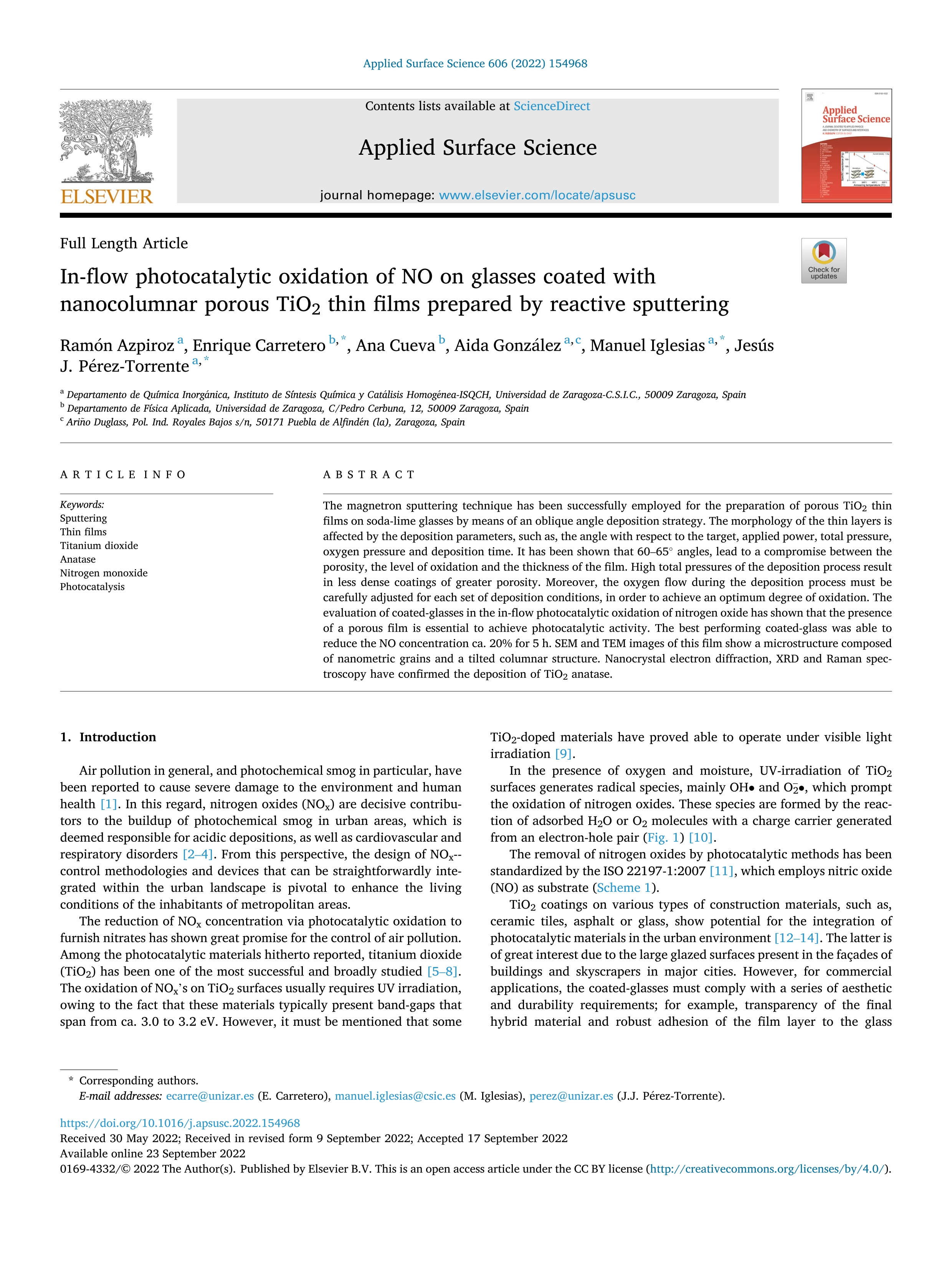 In-flow photocatalytic oxidation of NO on glasses coated with nanocolumnar porous TiO2 thin films prepared by reactive sputtering