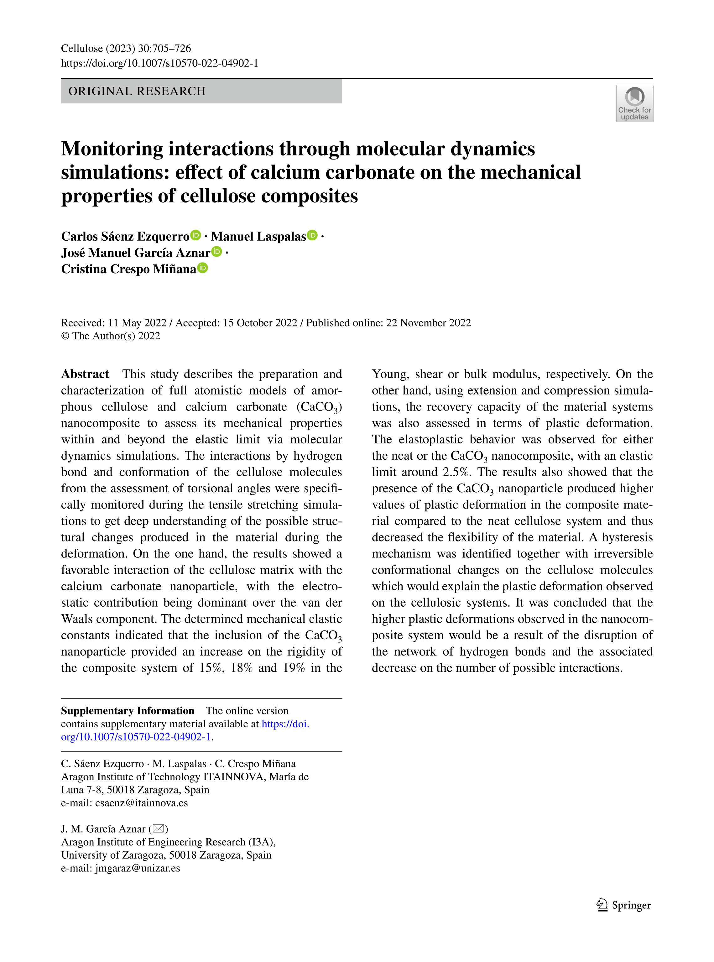 Monitoring interactions through molecular dynamics simulations: effect of calcium carbonate on the mechanical properties of cellulose composites