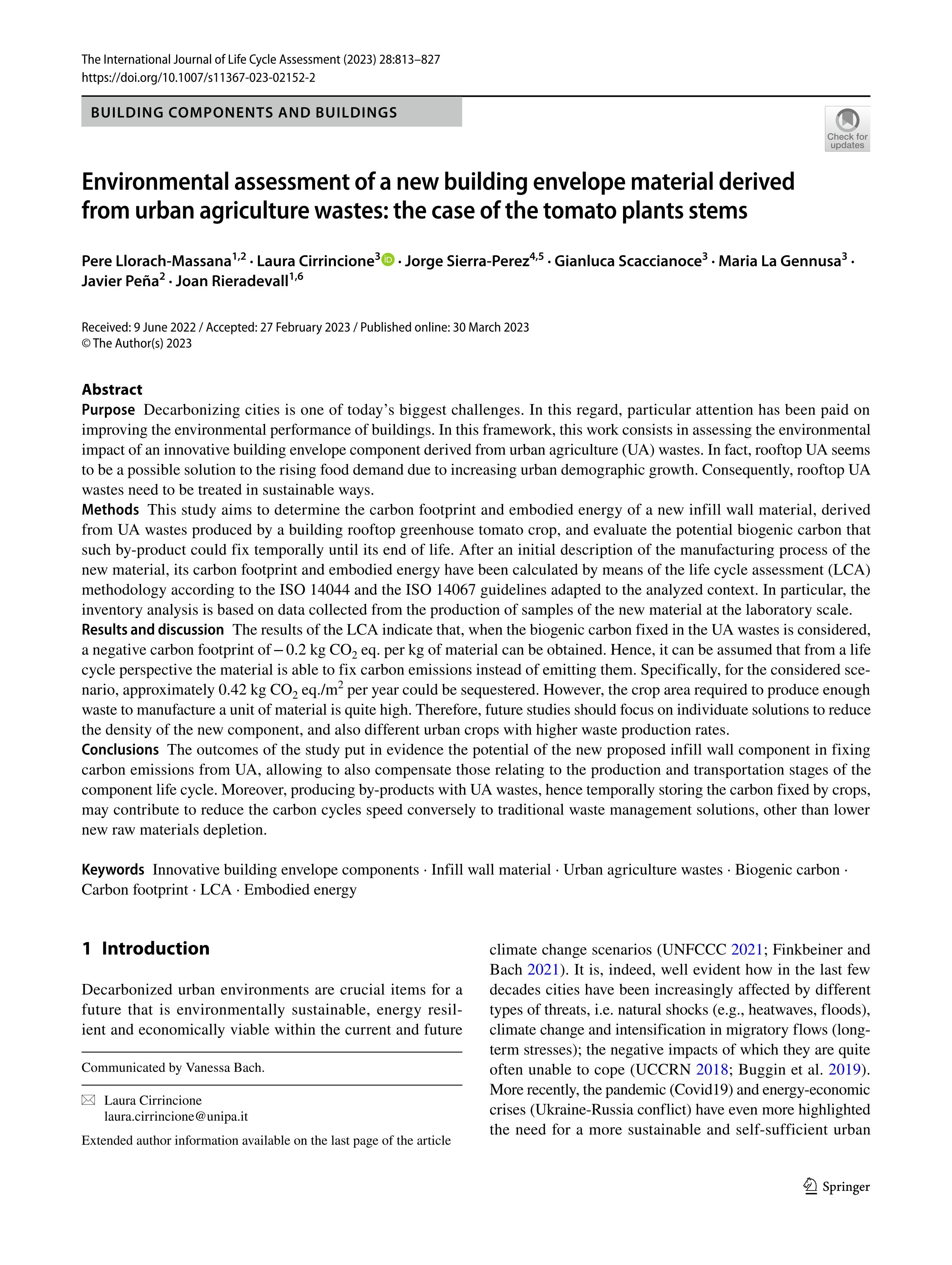 Environmental assessment of a new building envelope material derived from urban agriculture wastes: the case of the tomato plants stems