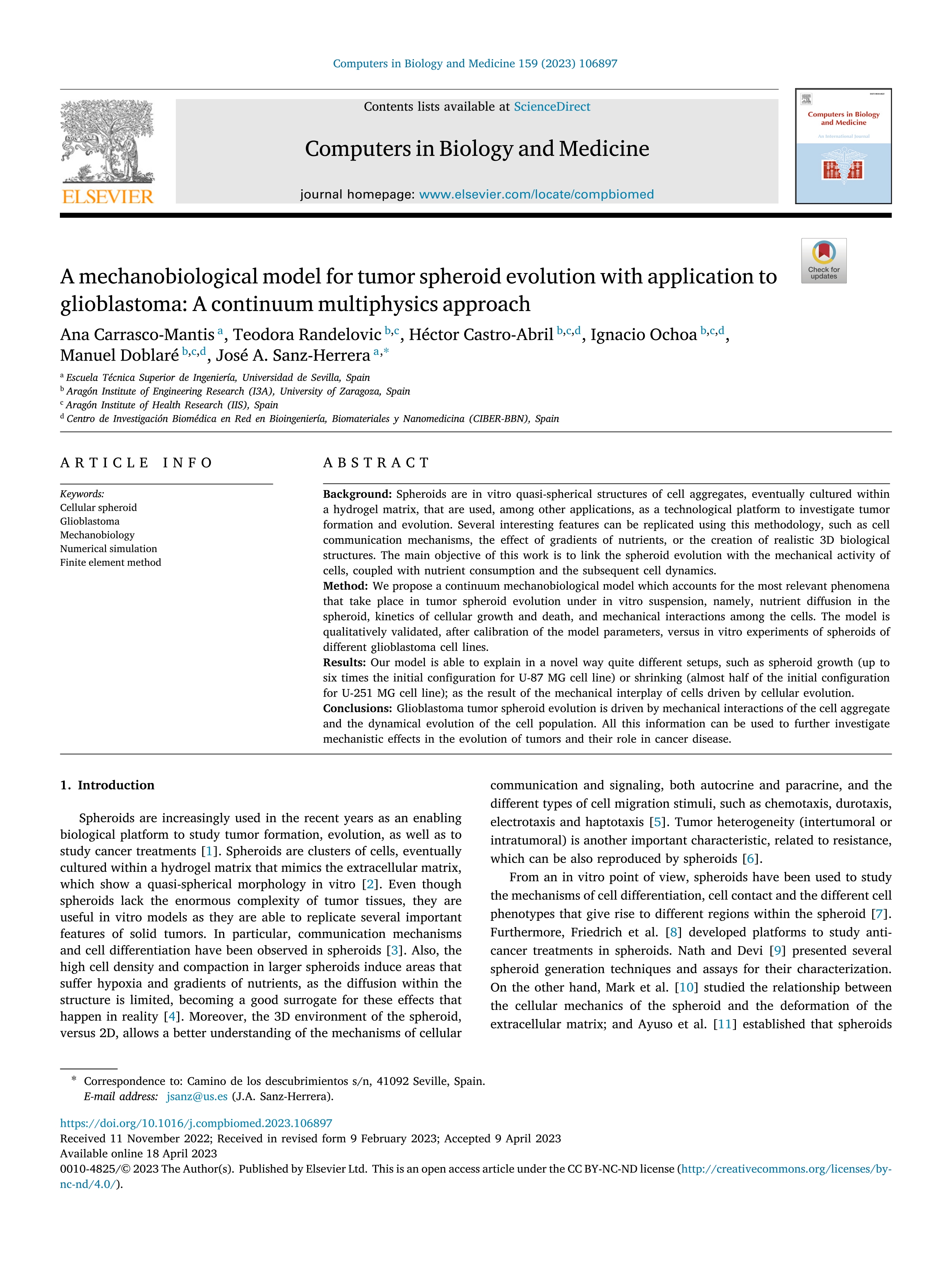 A mechanobiological model for tumor spheroid evolution with application to glioblastoma: A continuum multiphysics approach