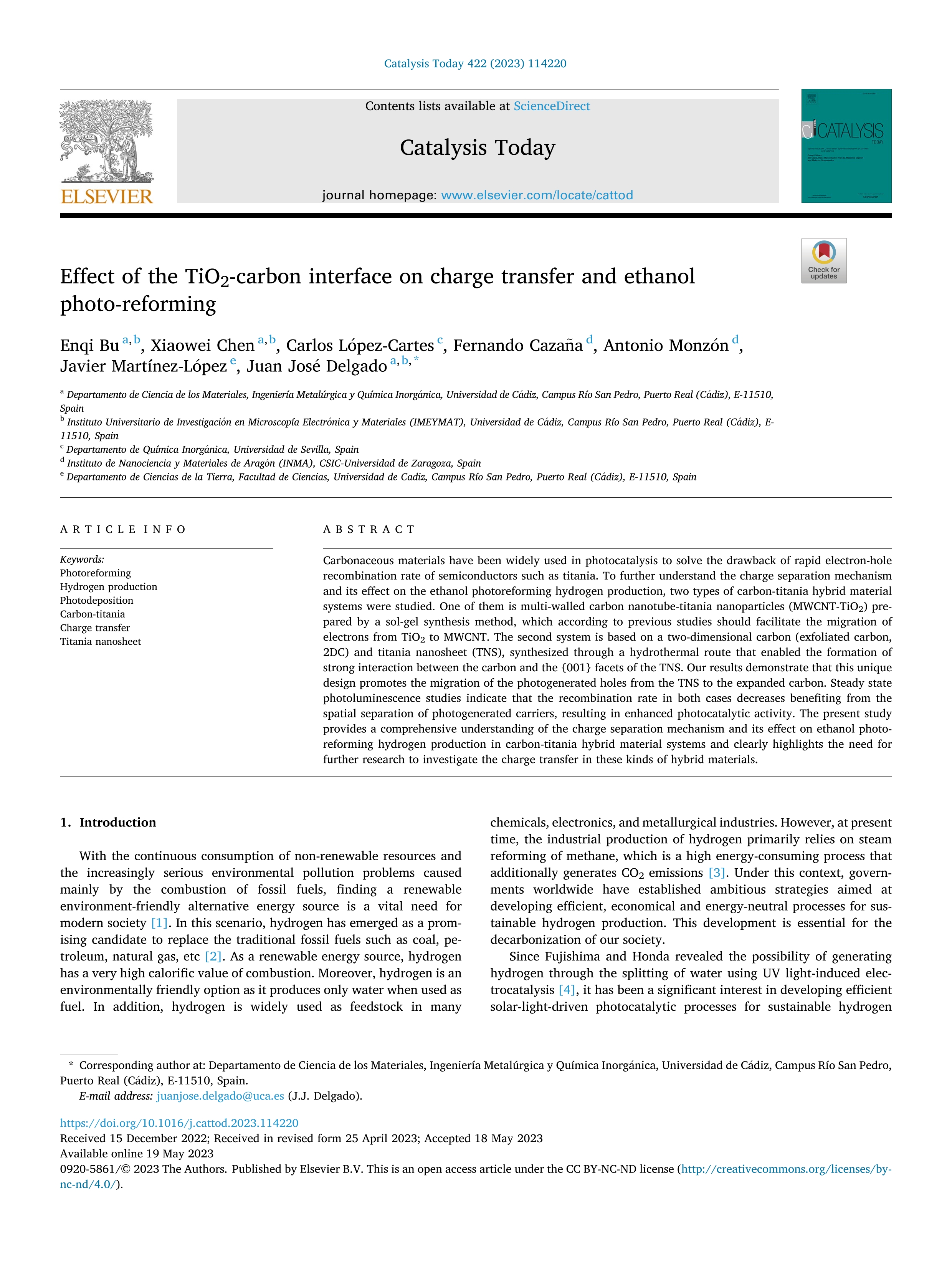 Effect of the TiO2-carbon interface on charge transfer and ethanol photo-reforming