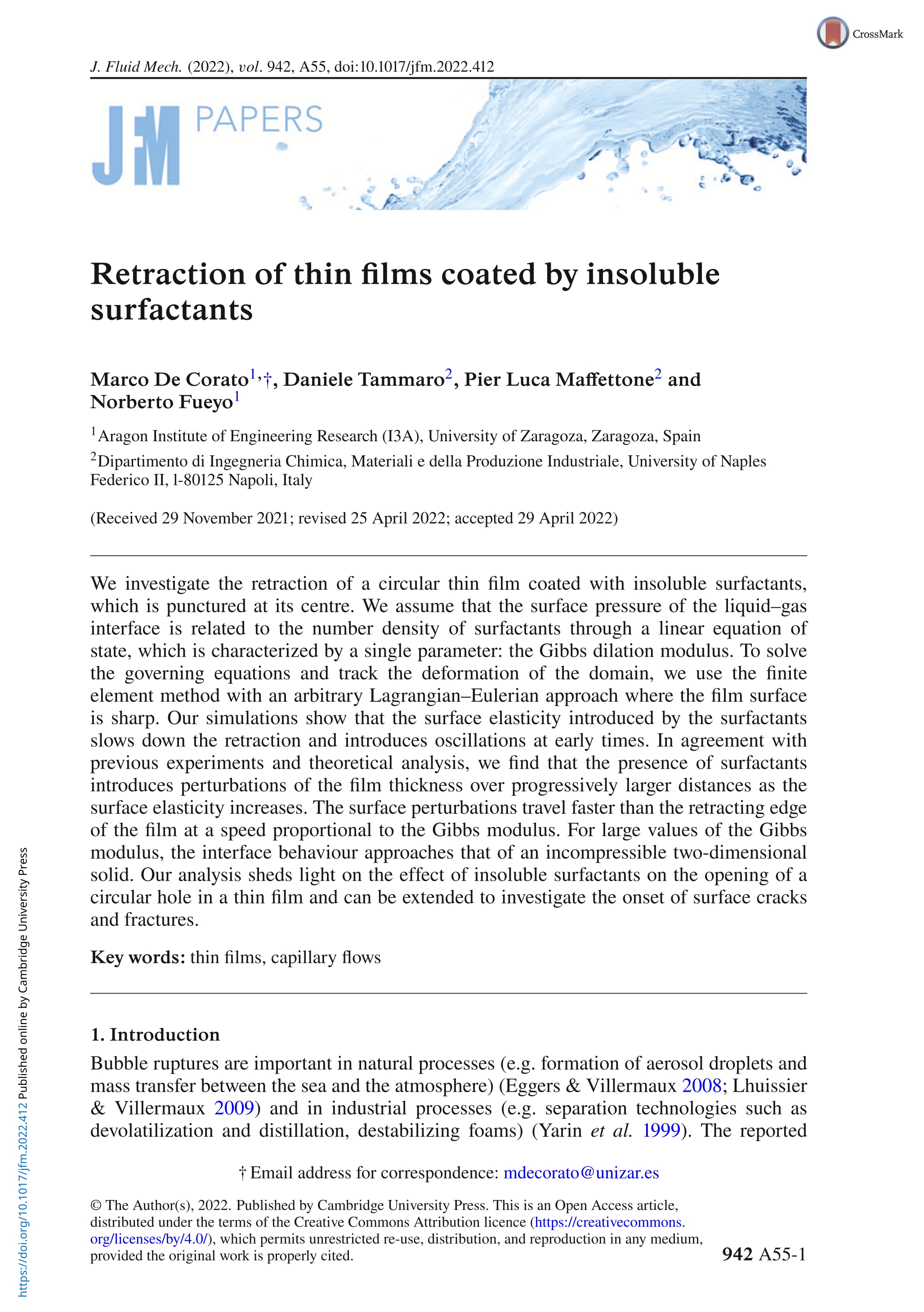 Retraction of thin films coated by insoluble surfactants