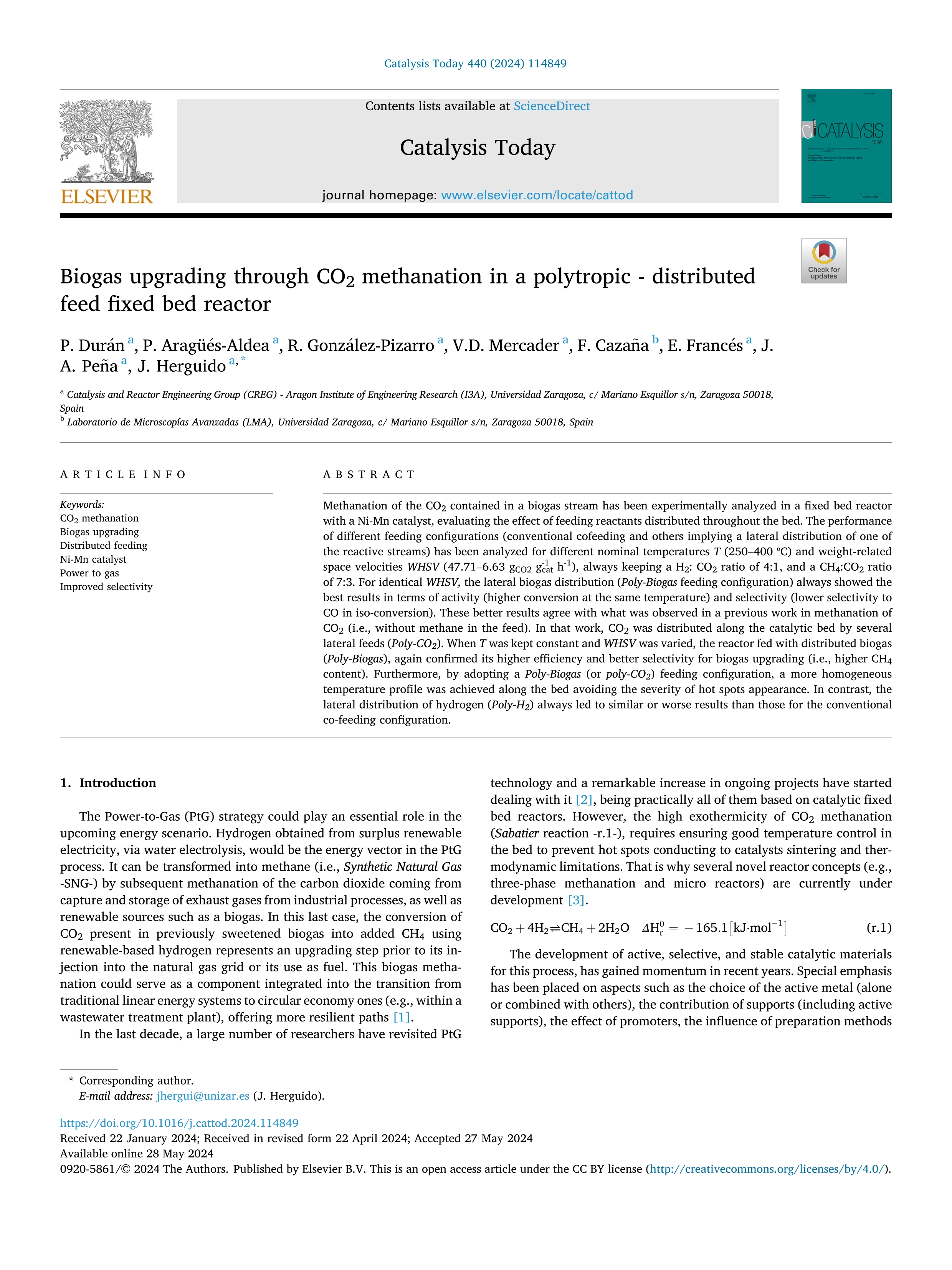 Biogas upgrading through CO2 methanation in a polytropic - distributed feed fixed bed reactor