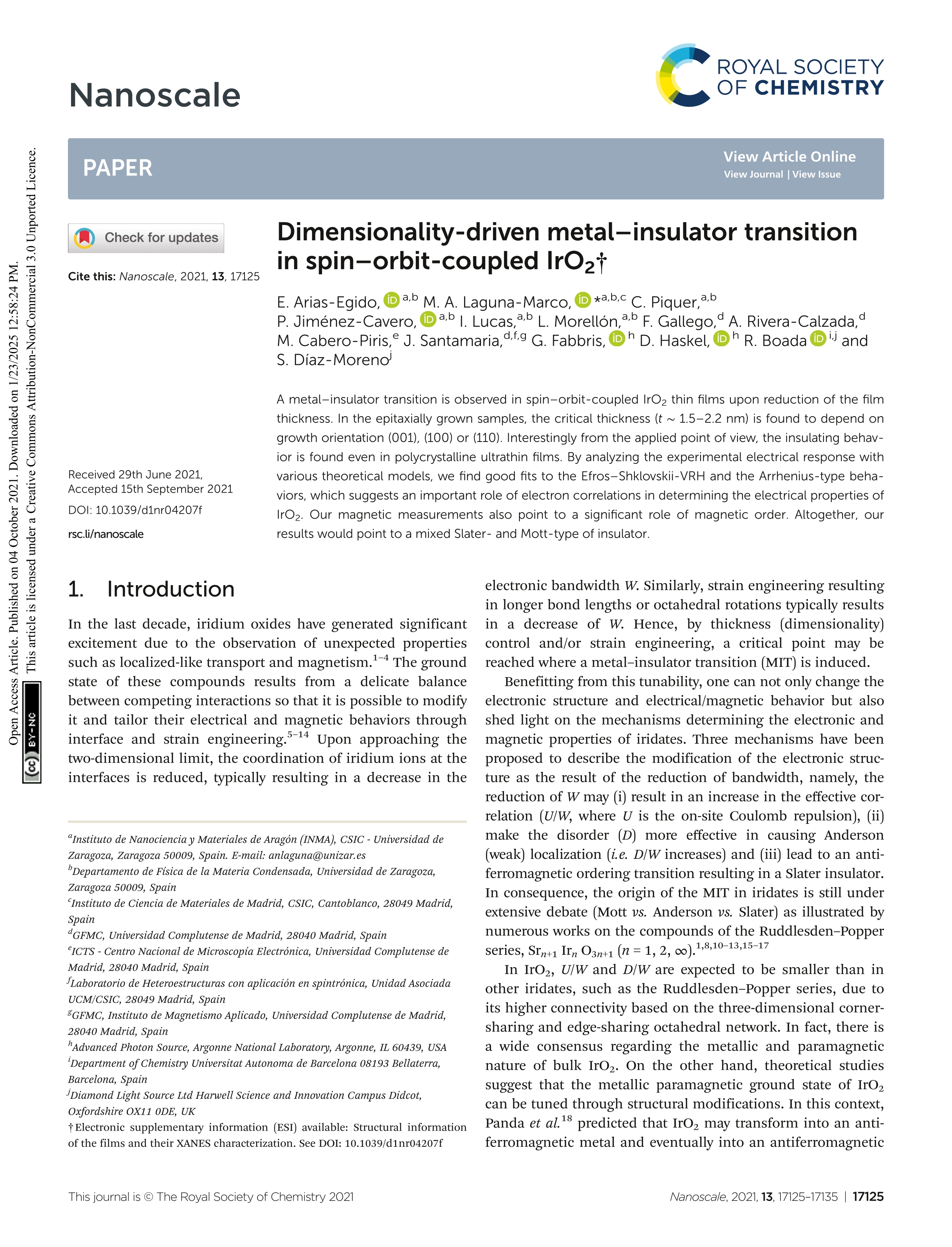 Dimensionality-driven metal-insulator transition in spin-orbit-coupled IrO2