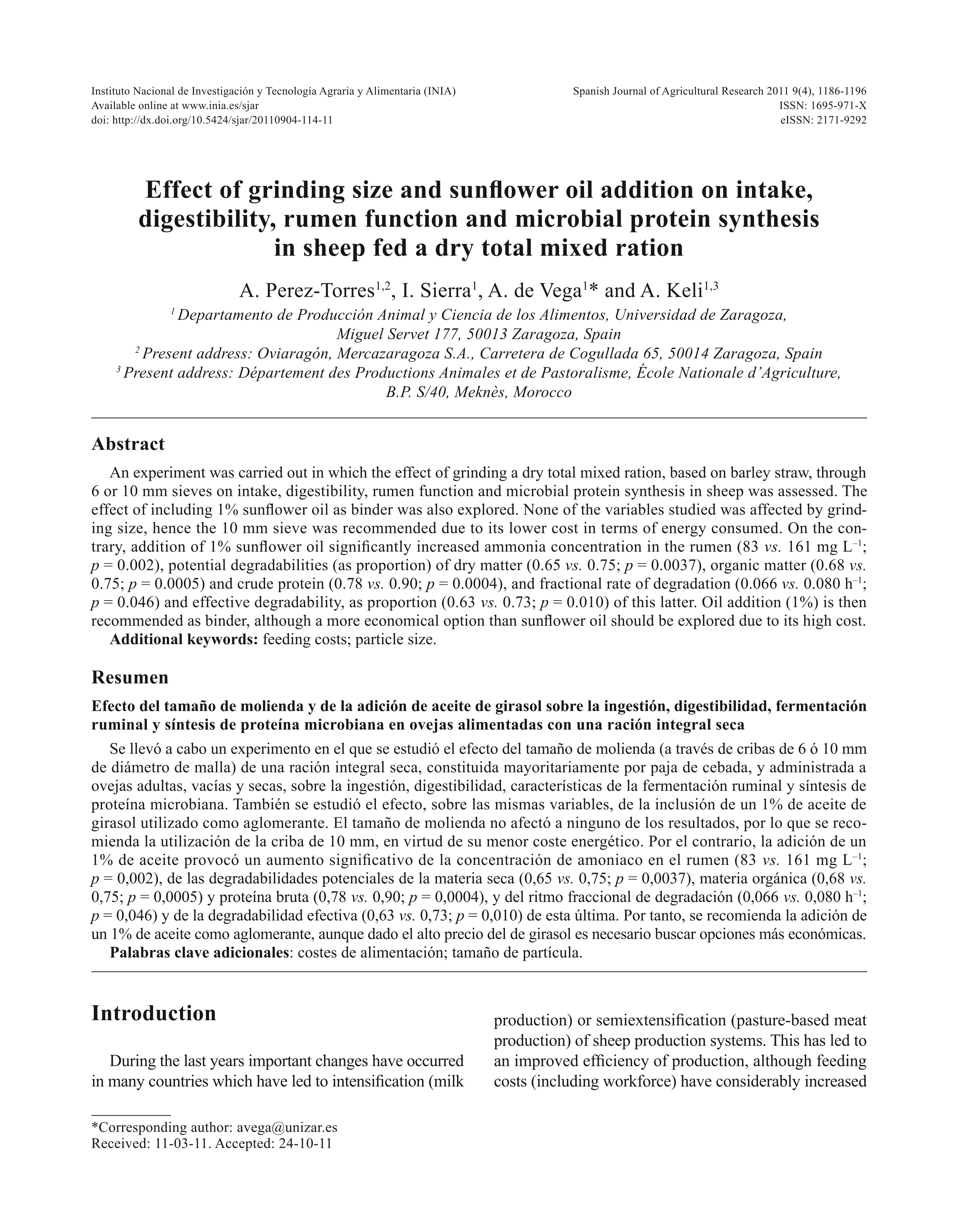 Effect of grinding size and sunflower oil addition on intake, digestibility, rumen function and microbial protein synthesis in sheep fed a dry total mixed ration