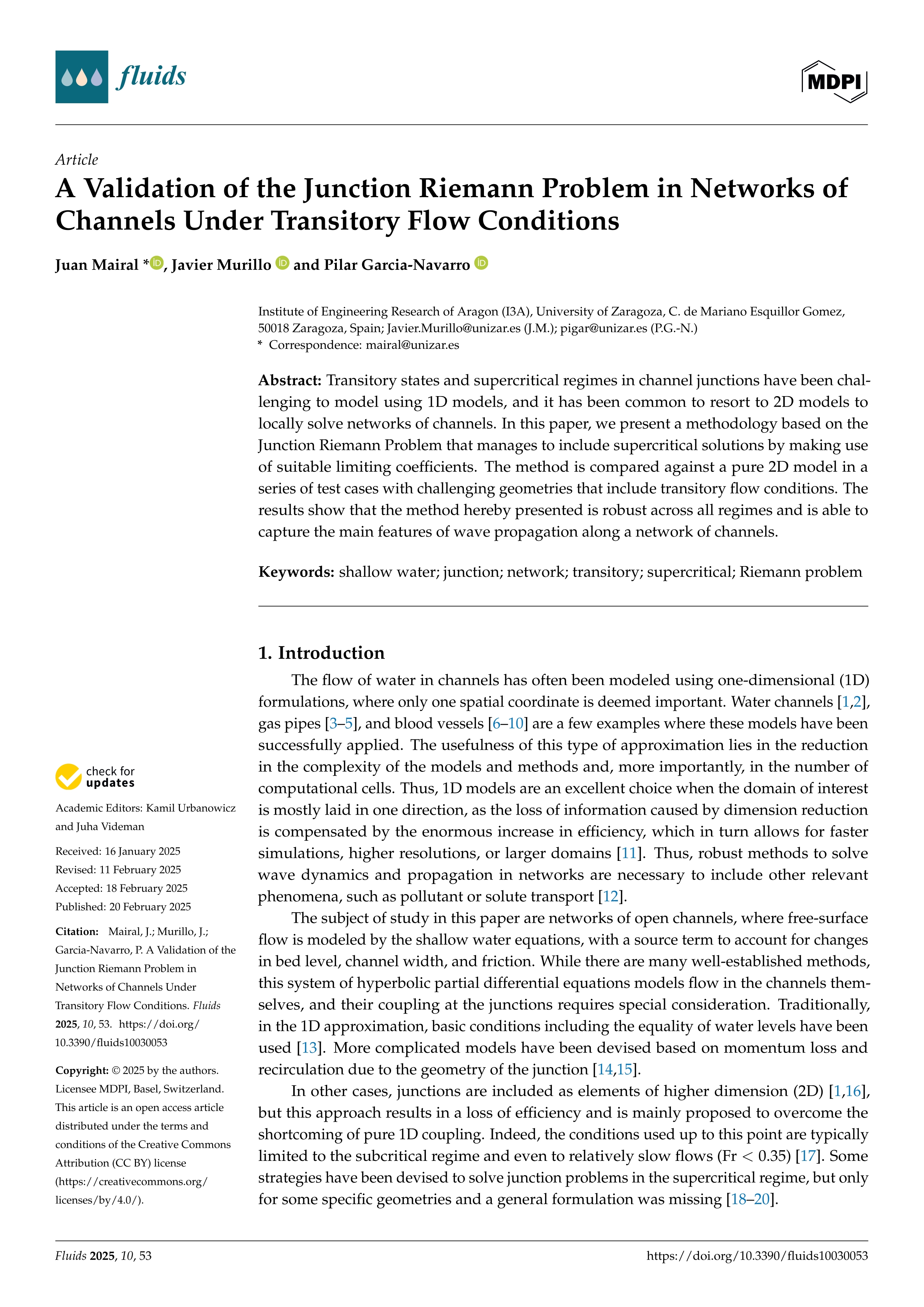 A Validation of the Junction Riemann Problem in Networks of Channels Under Transitory Flow Conditions