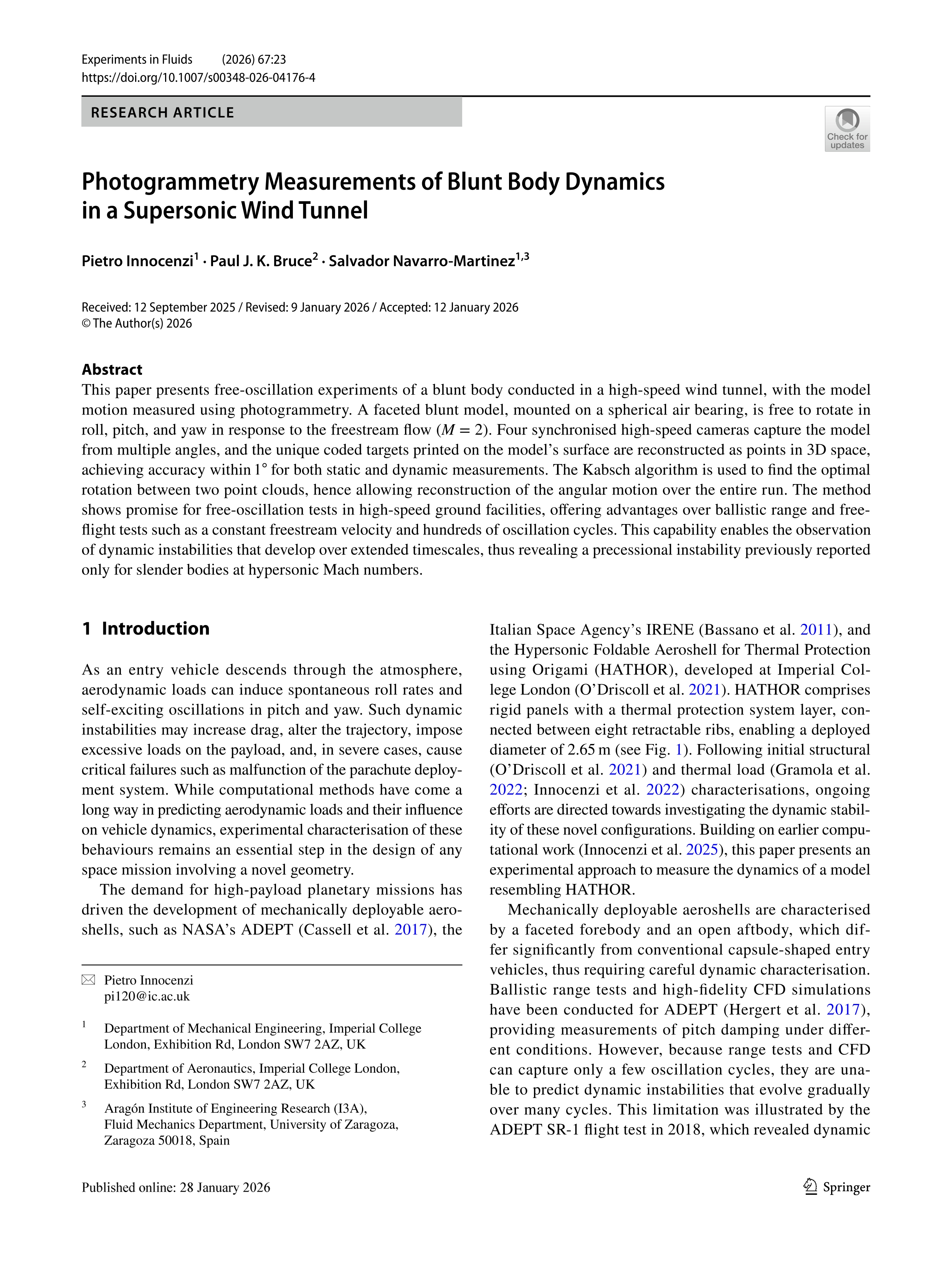 Photogrammetry Measurements of Blunt Body Dynamics in a Supersonic Wind Tunnel