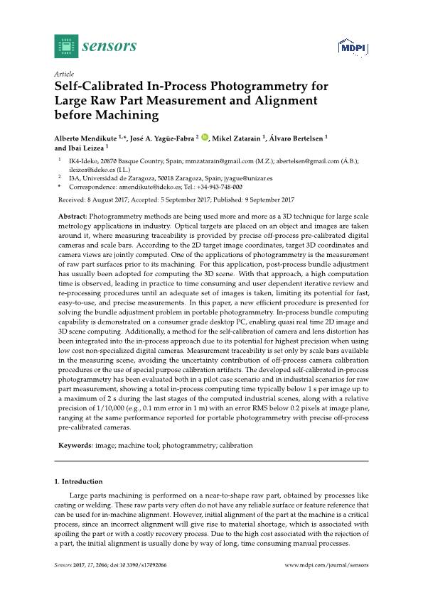 Self-calibrated in-process photogrammetry for large raw part measurement and alignment before machining
