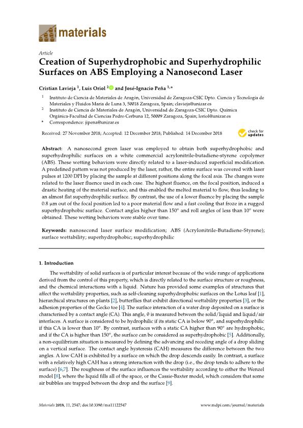 Creation of superhydrophobic and superhydrophilic surfaces on ABS employing a nanosecond laser